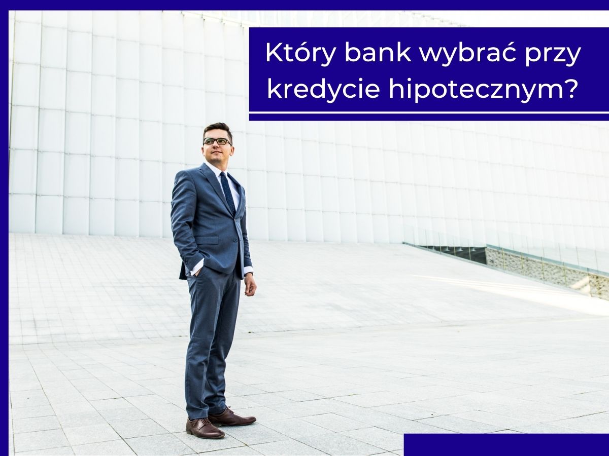 Mężczyzna w garniturze stoi przed nowoczesnym budynkiem. Tekst: Który bank wybrać przy kredycie hipotecznym?